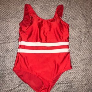 One piece red swimsuit with 2 white stripes